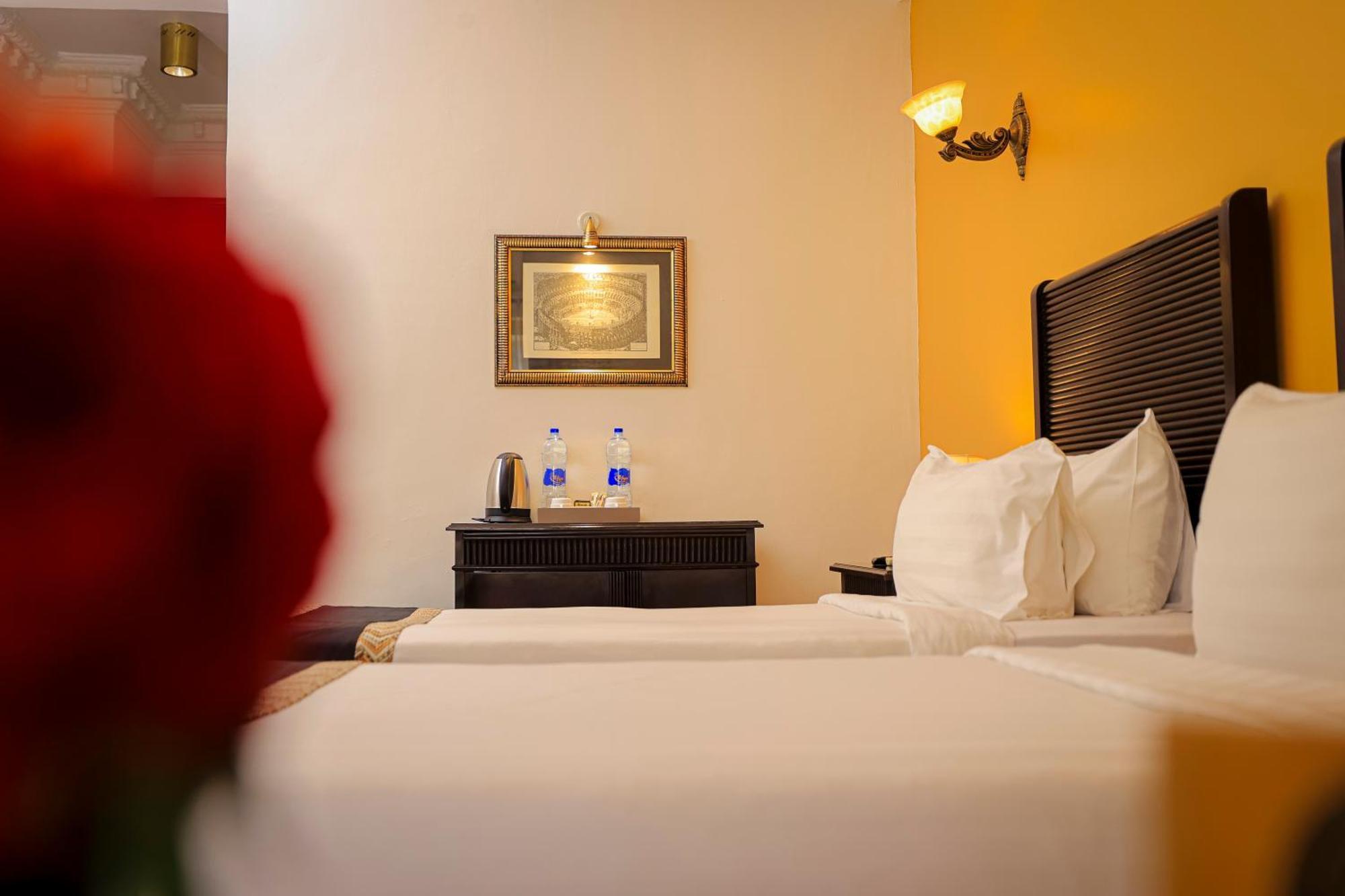 Colosseum Boutique Hotel & Spa Dar es Salaam Quarto foto